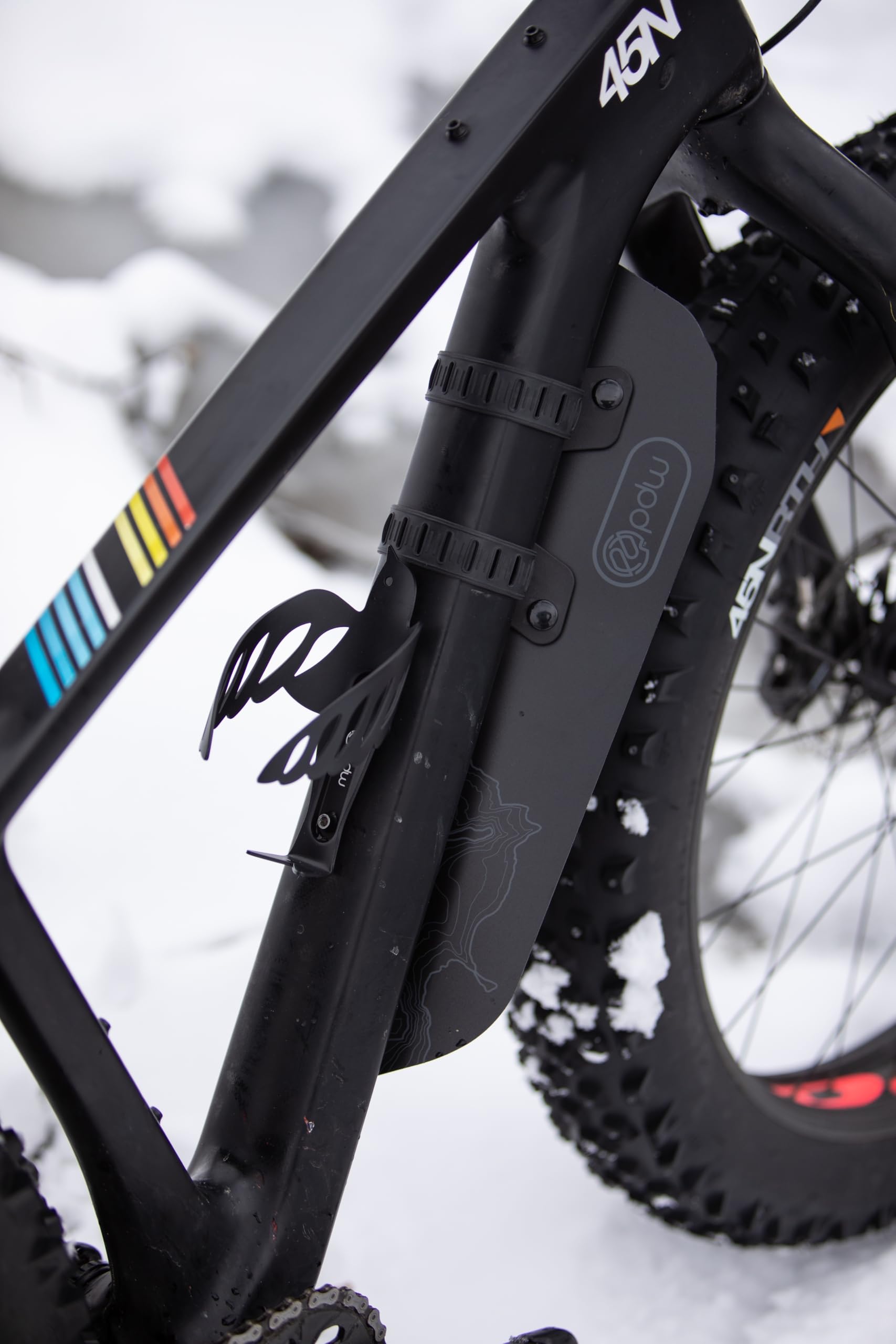 Portland Design Works Mud Shovel next to 700c wheel for size and length comparison