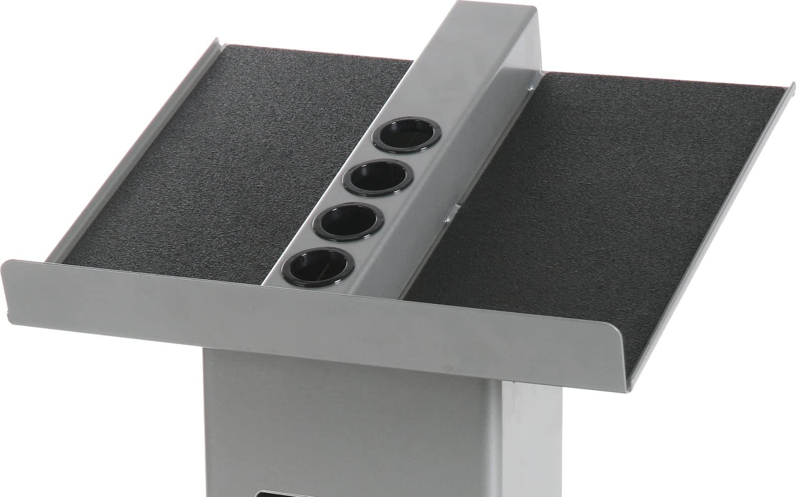 POWERBLOCK stand holding full dumbbells and adders for fast weight changes