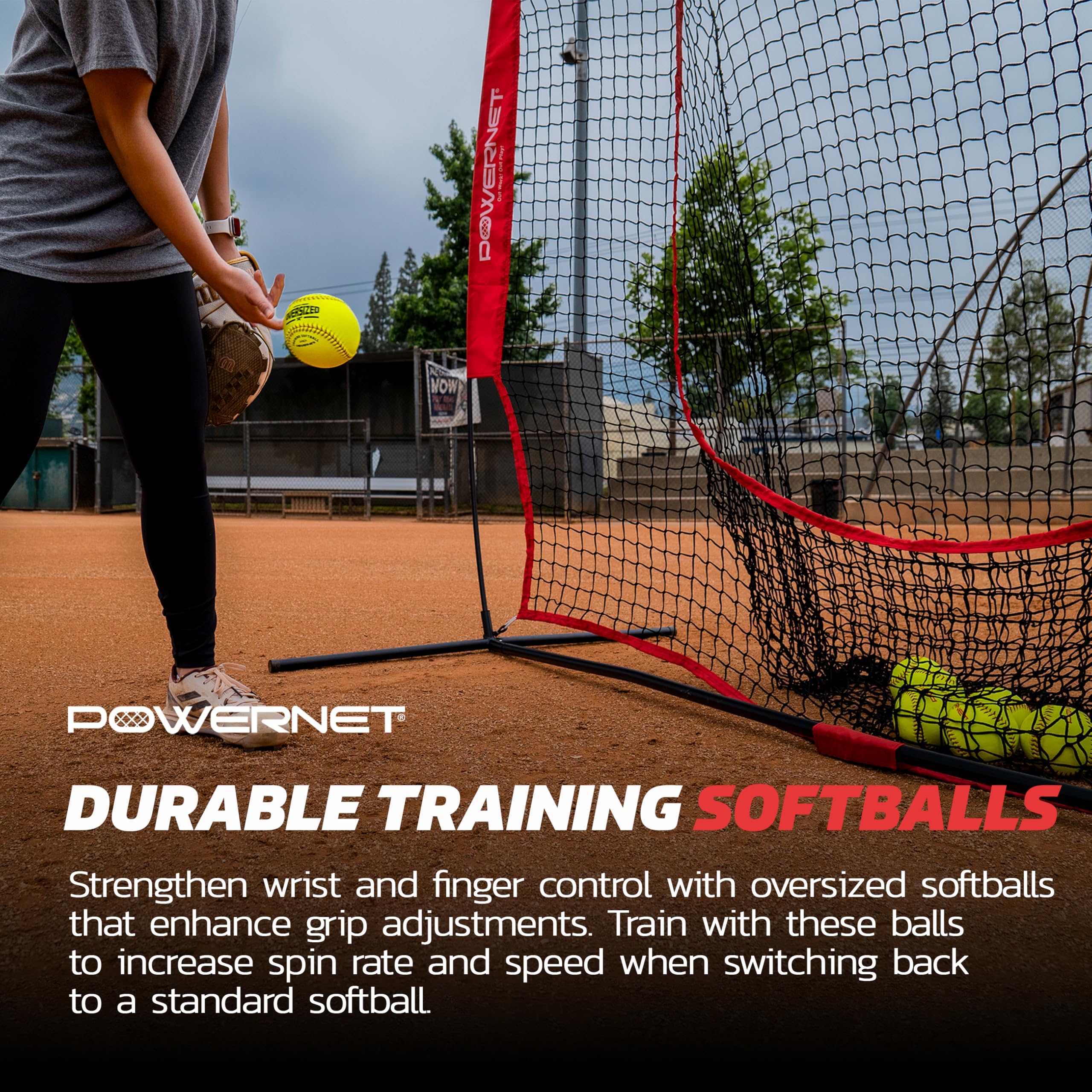PowerNet pitcher using oversized ball in drill to enhance snap and spin development