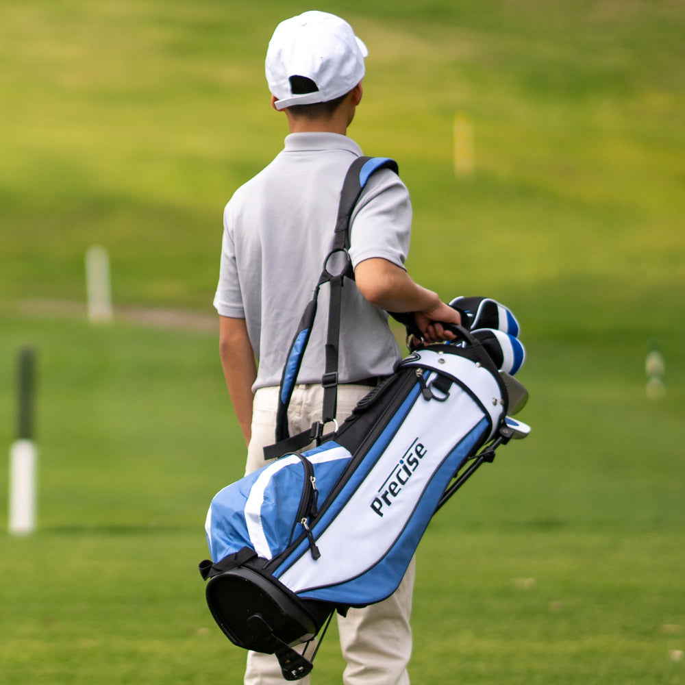 PRECISE child holding club on tee demonstrating ergonomic fit and confidence