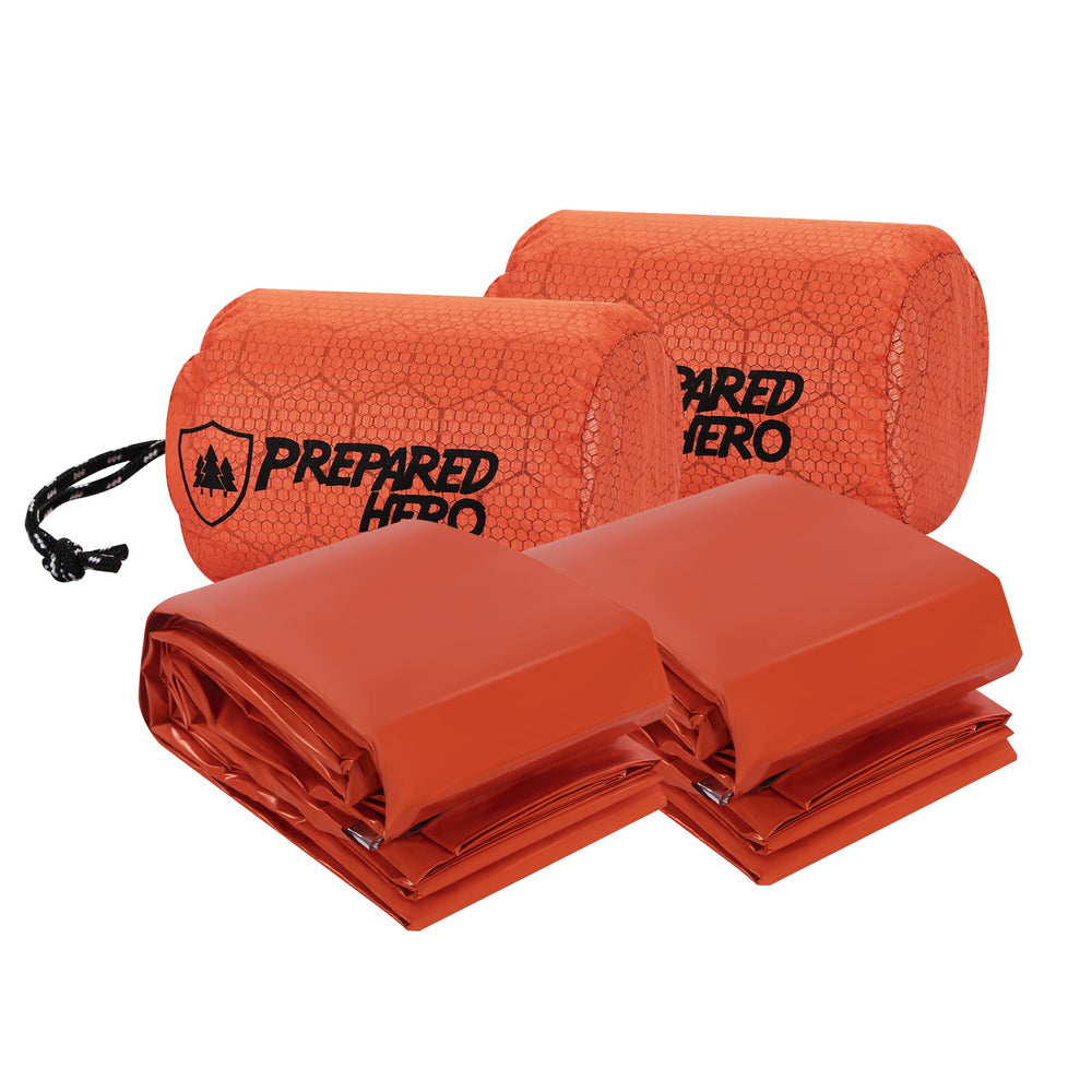 Prepared Hero front packaging showing two orange emergency bivy bags and compact packability benefit