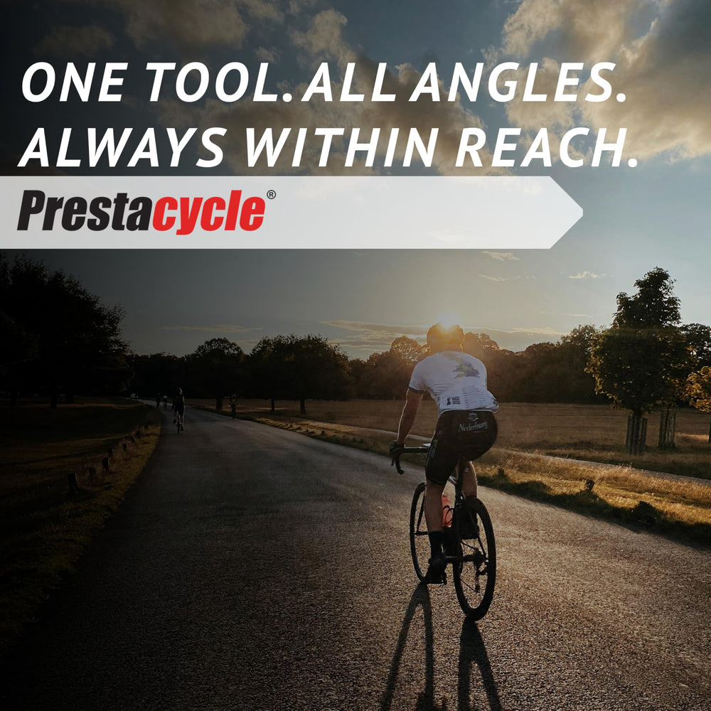 Prestacycle tool beside ruler on bench showing compact 100mm extension scale