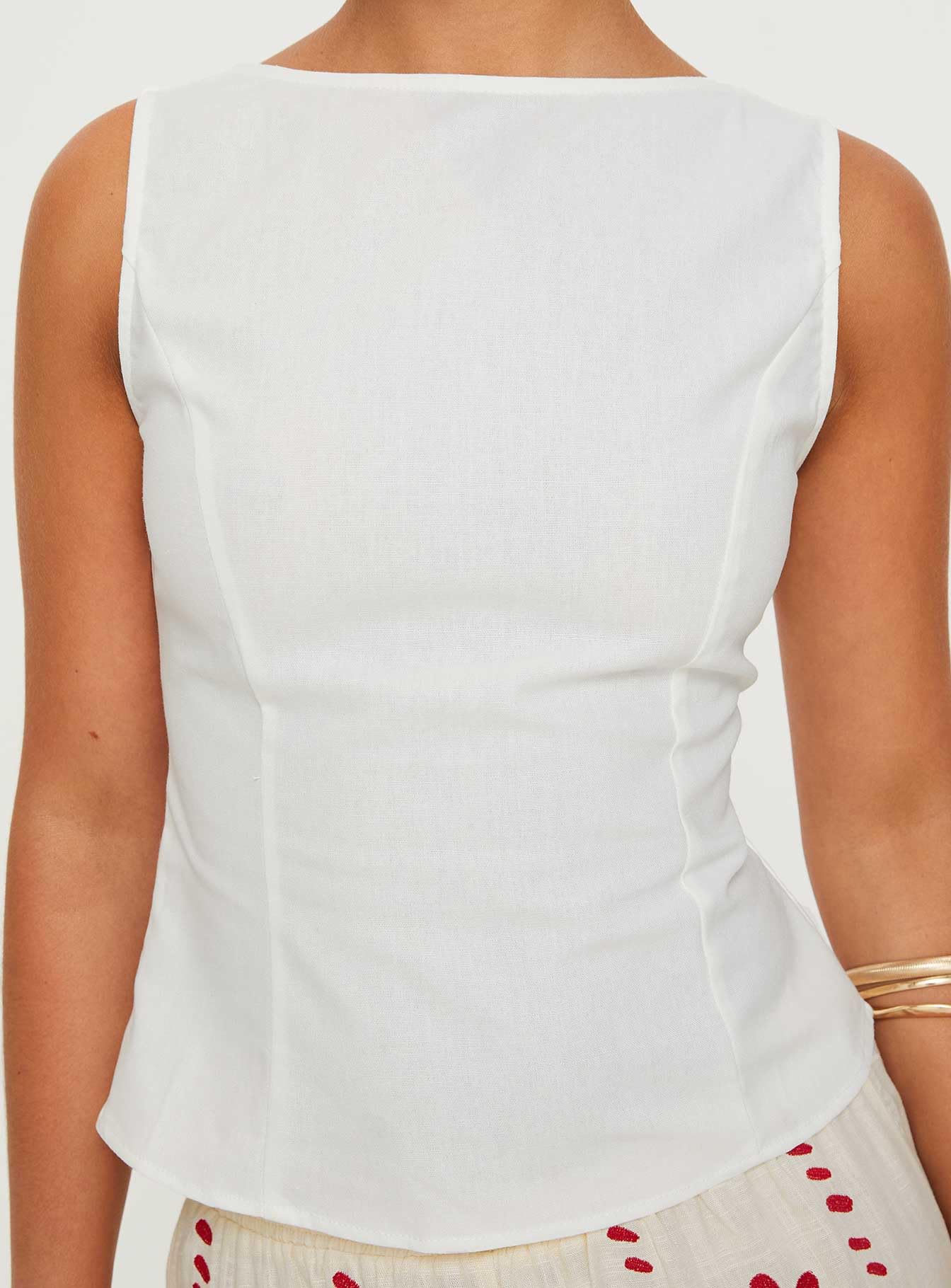 Princess Polly sleeve and neckline detail showing boat neck structure and neat finish benefit