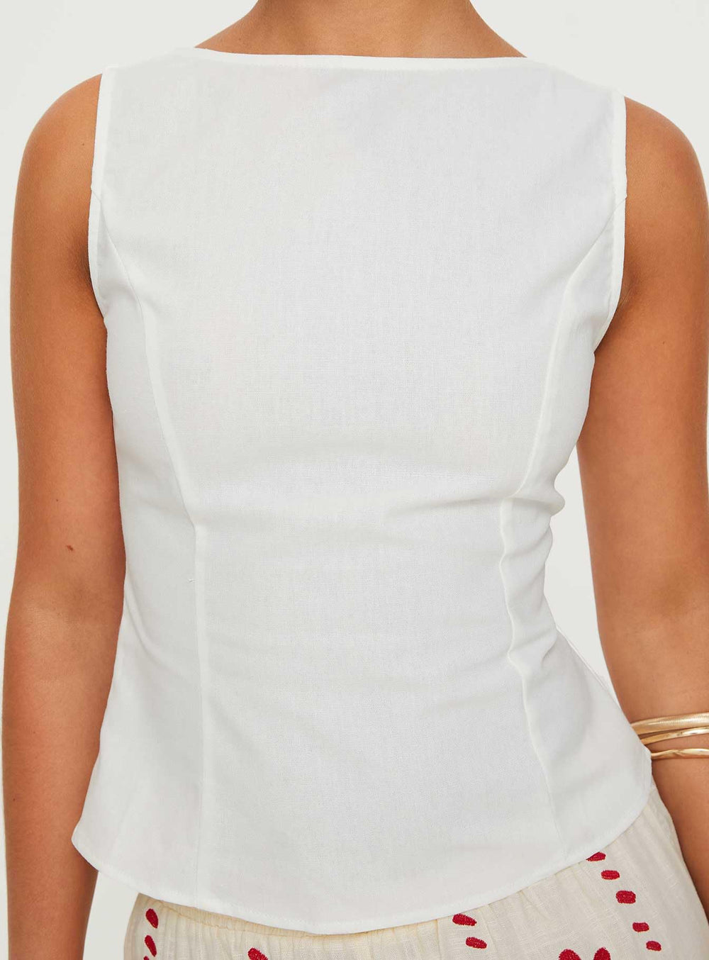 Princess Polly Lilitina top side profile silhouette showing structured non-stretch fit