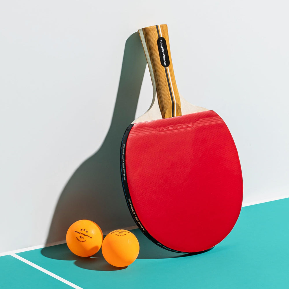 PRO-SPIN orange ball against background demonstrating high-visibility tracking