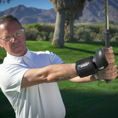 PRO SENDR in-use during a golf swing demonstrating improved wrist position and control