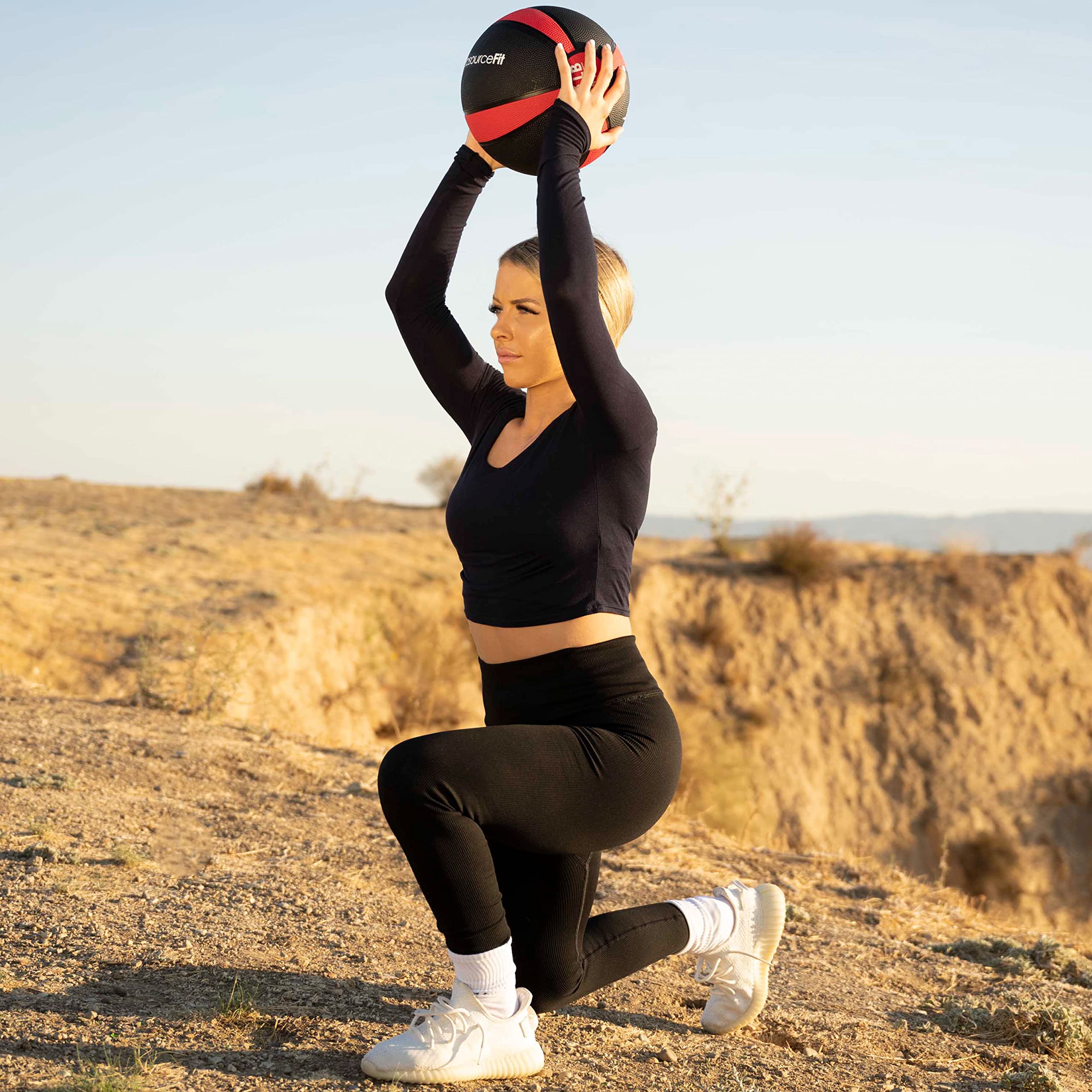 ProsourceFit medicine ball in a home gym setup emphasizing compact portability