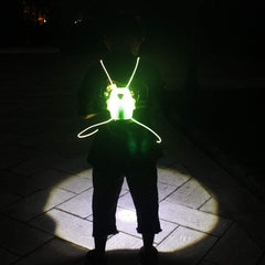 QNLALZM back view on cyclist at night illustrating rear visibility benefit