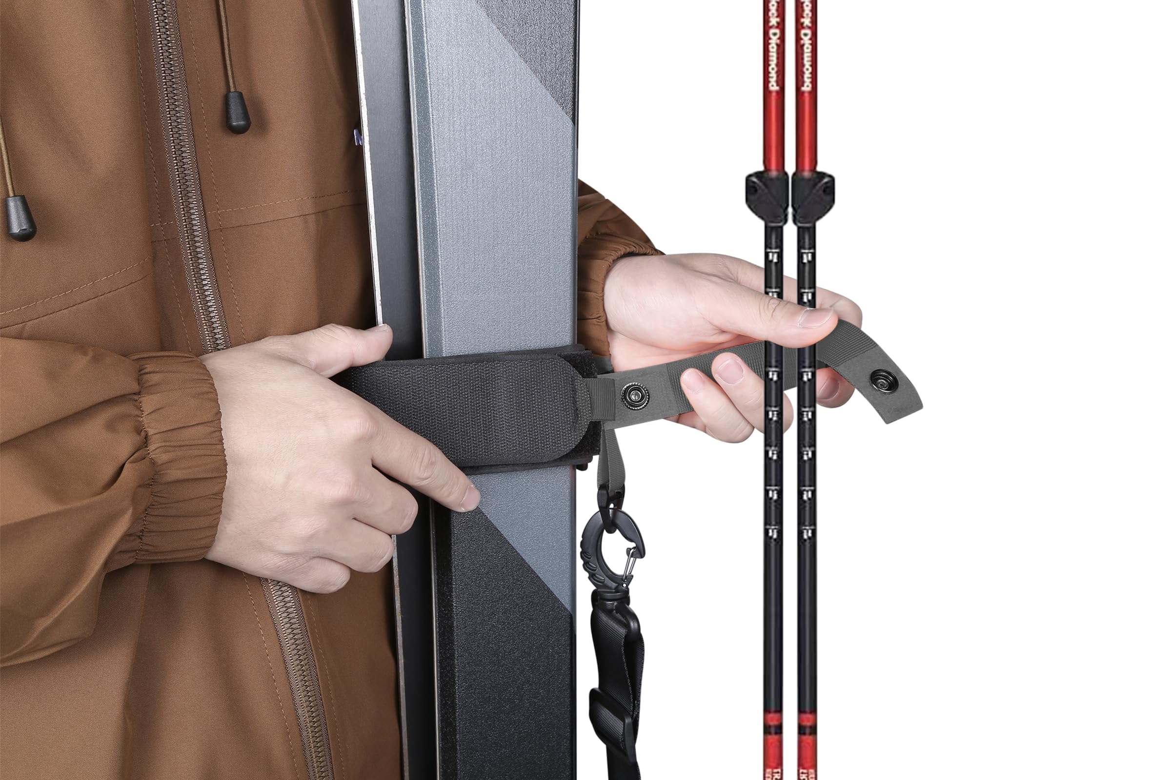 QOGIR scale with hand and skis illustrating lightweight portability