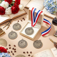 Quelay medal held in hand showing scale and classroom suitability