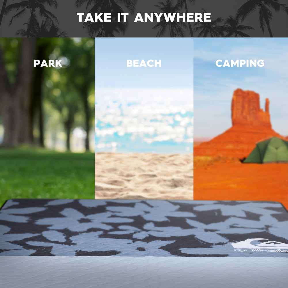 Quiksilver large mat spread on sand keeping family area dry and sand-resistant