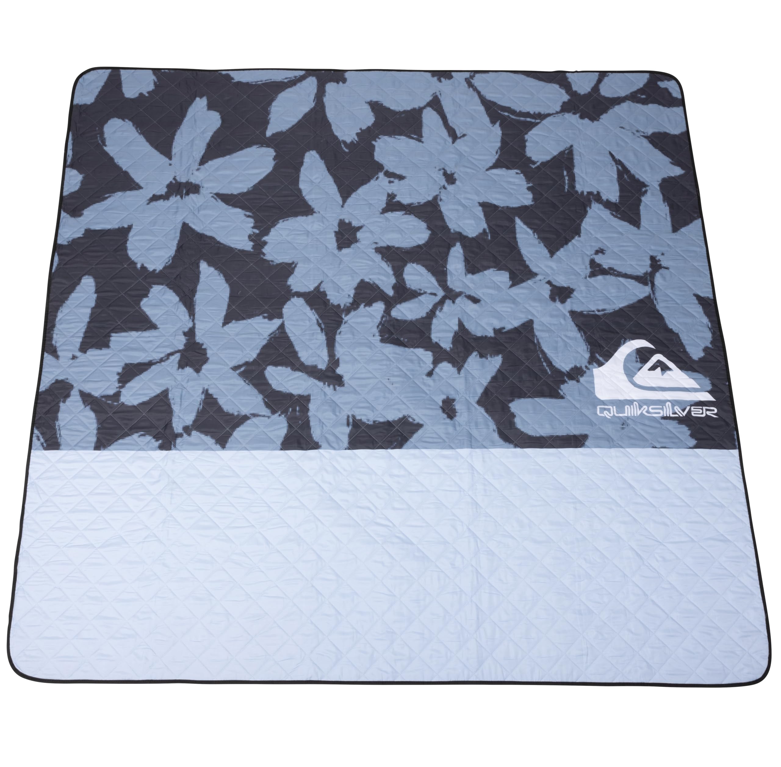 Quiksilver mat beside beach bag and towel illustrating true-to-size scale and capacity