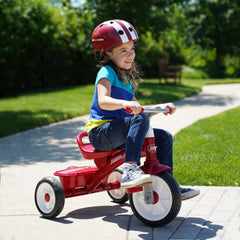 Radio Flyer pink helmet chin strap detail showing quick-release buckle for secure fastening