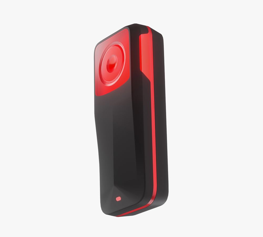 Ravemen NT201 beside a coin for size and weight scale comparison