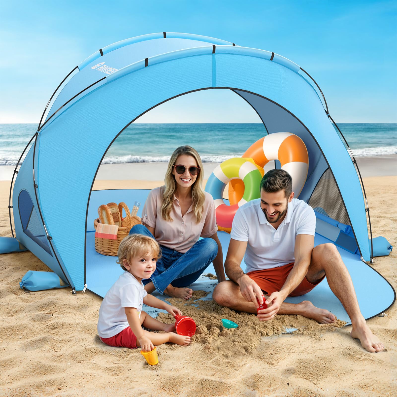 Raynesys family using tent on beach showing shade and leisure benefit