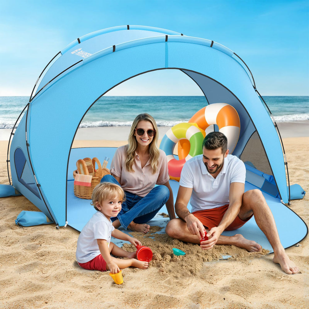 Raynesys family using tent on beach showing shade and leisure benefit