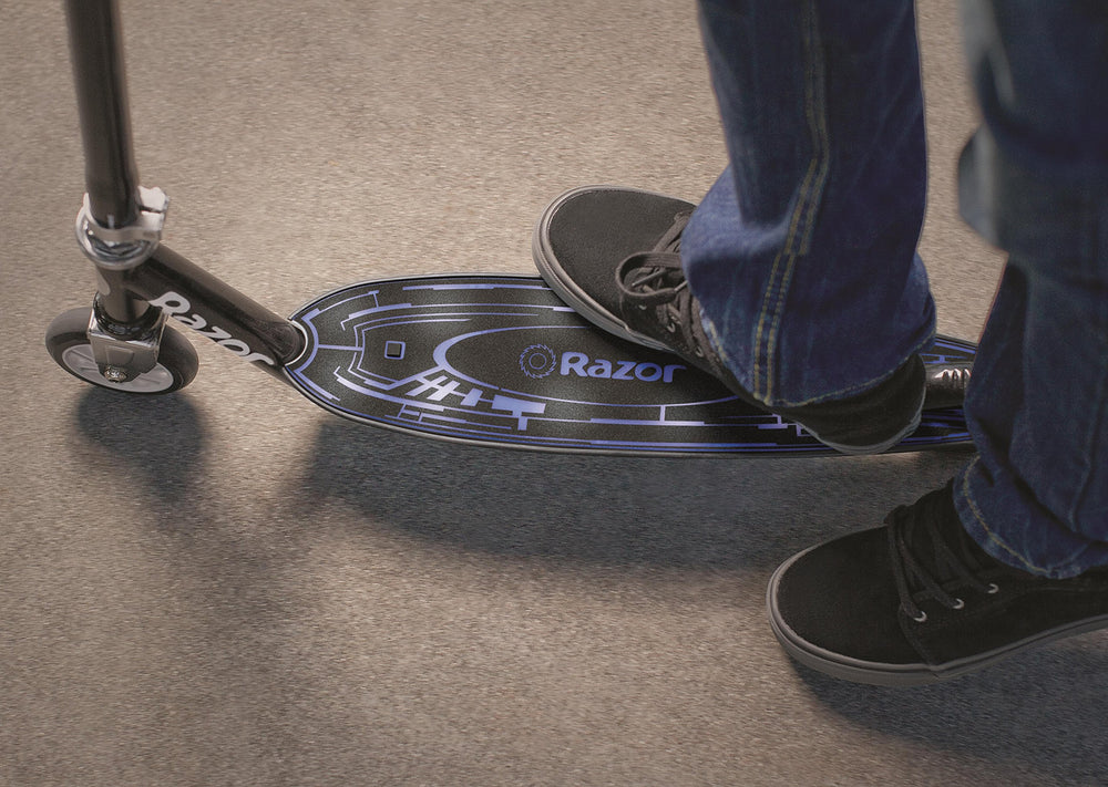 Razor Tekno rider in action demonstrating smooth cruising and playful illumination
