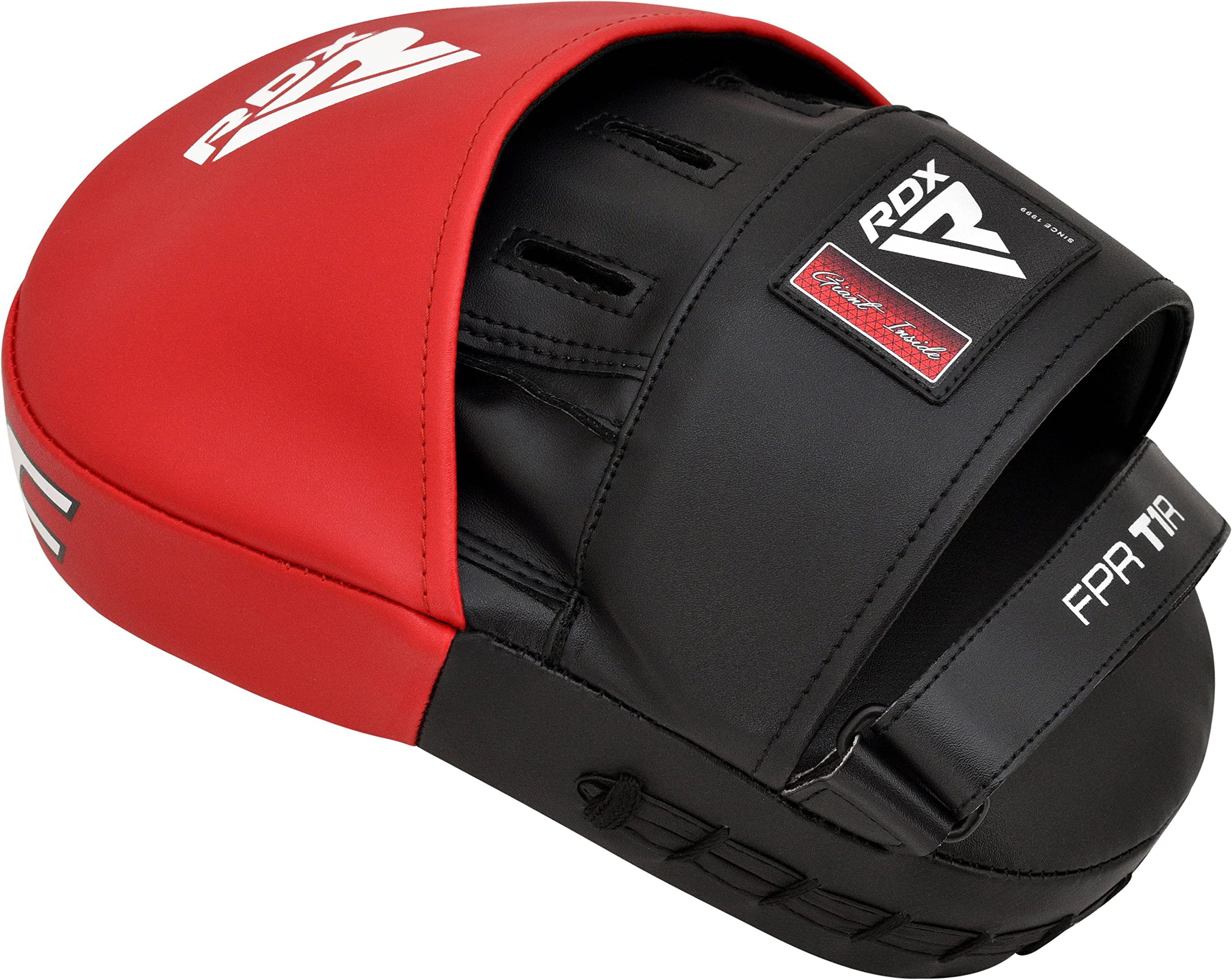 RDX pads beside gloves for scale showing compact size and portability