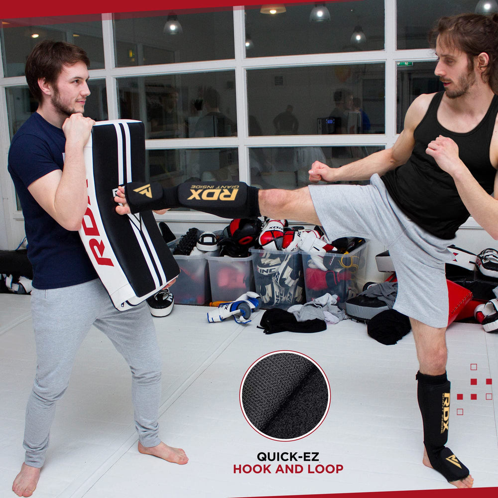 RDX straps and velcro adjustment showing padded straps that secure the shield to forearm