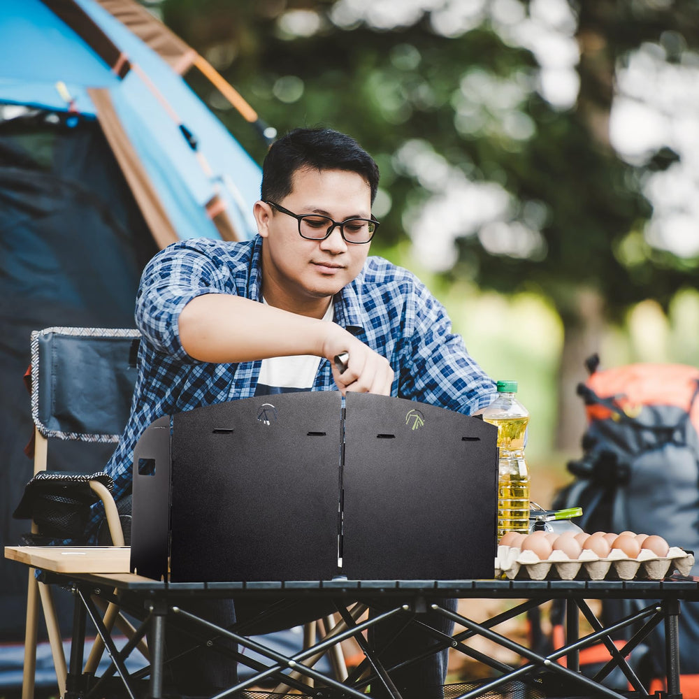 REDCAMP lifestyle scene of tent and picnic with windscreen improving outdoor cooking
