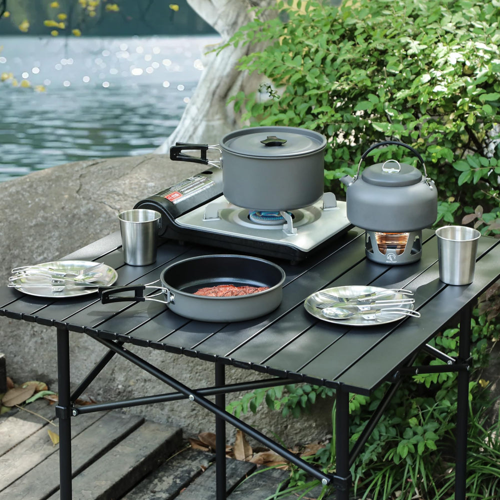 REDCAMP cookware in campfire cooking scene showing practical outdoor meal use