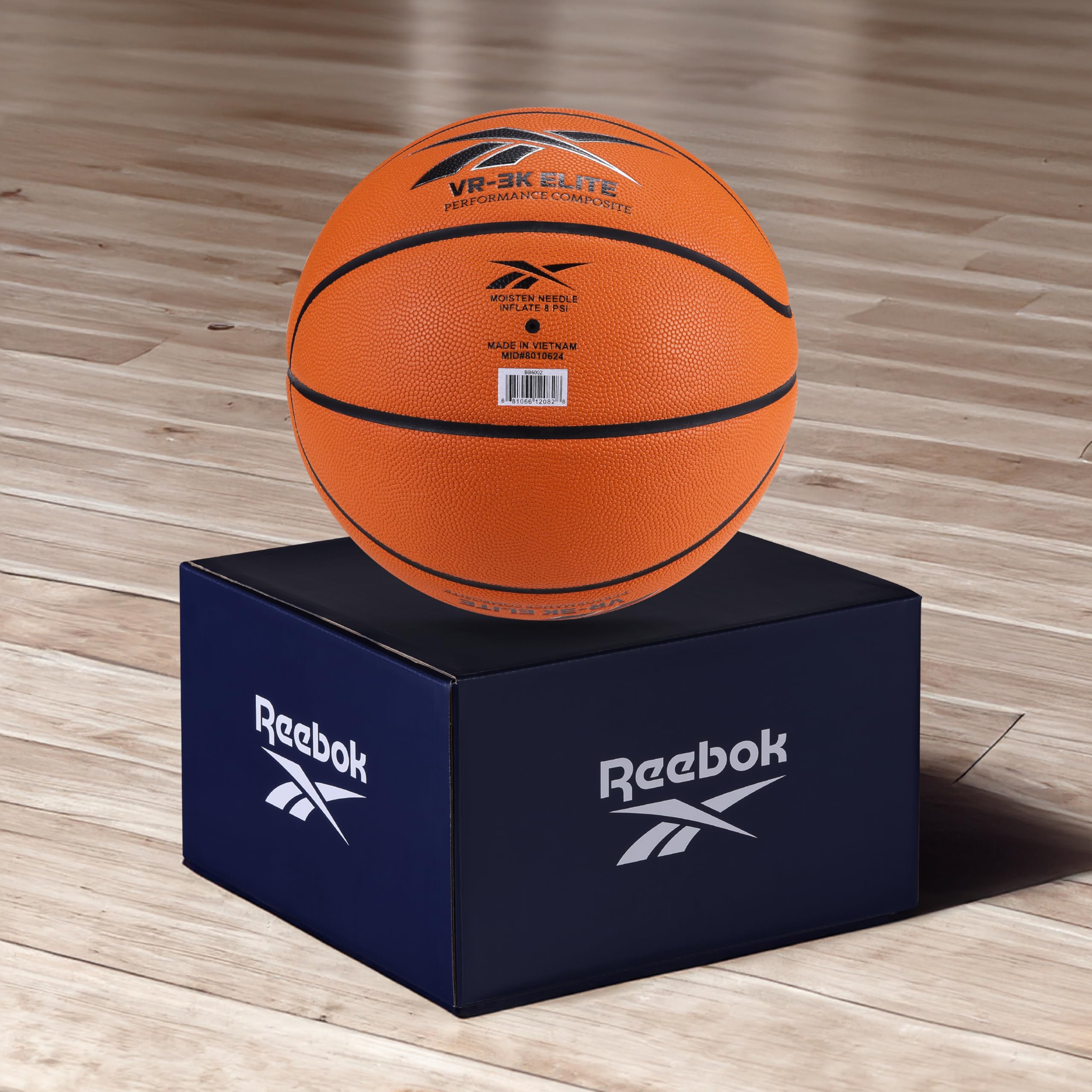 Reebok basketball in hand demonstrating anti-slip grip for confident dribbling
