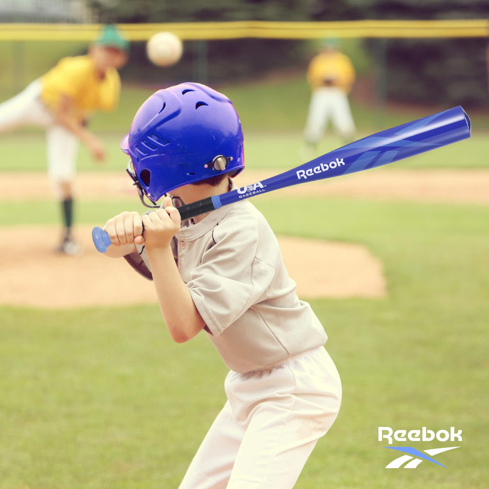 Reebok bat in backyard game scene with kids, durable design for everyday play