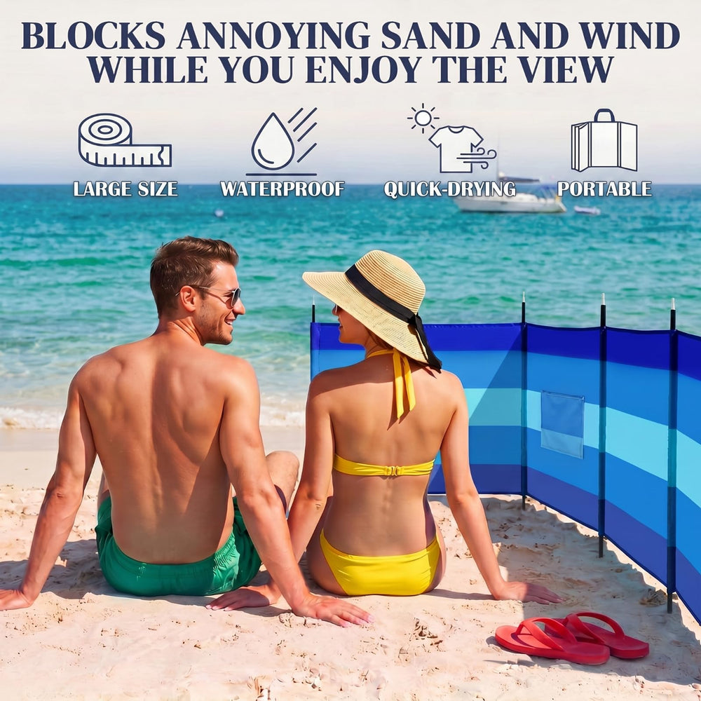 Remagr beach scene with family sheltered showing wind and sand protection