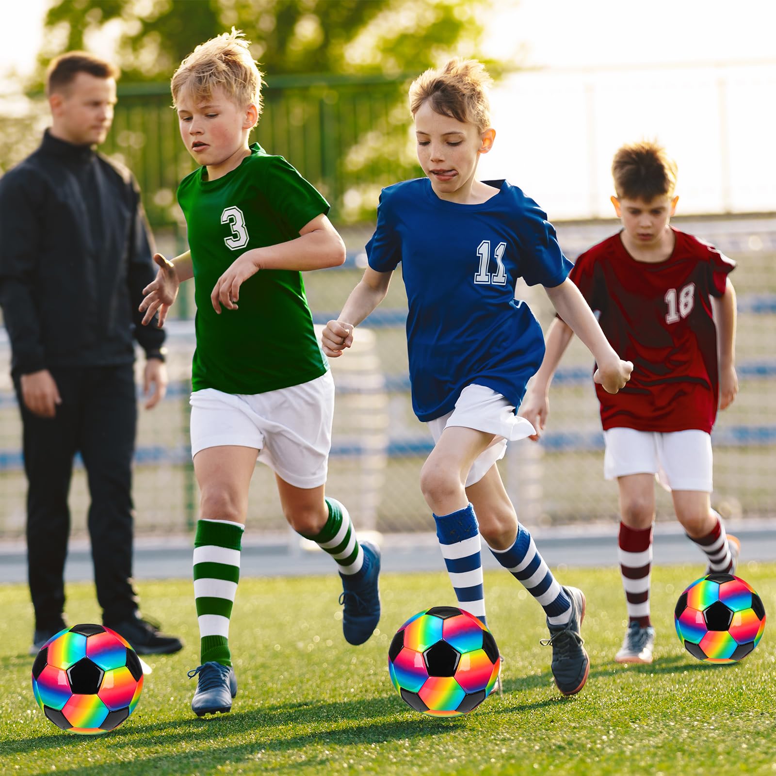 Retisee soccer ball on grass in play shows visibility and outdoor use