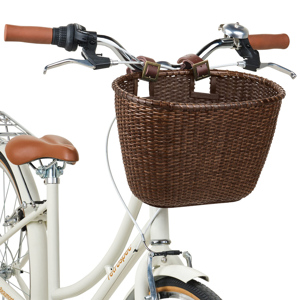 Retrospec basket beside backpack illustrating size and scale for small loads