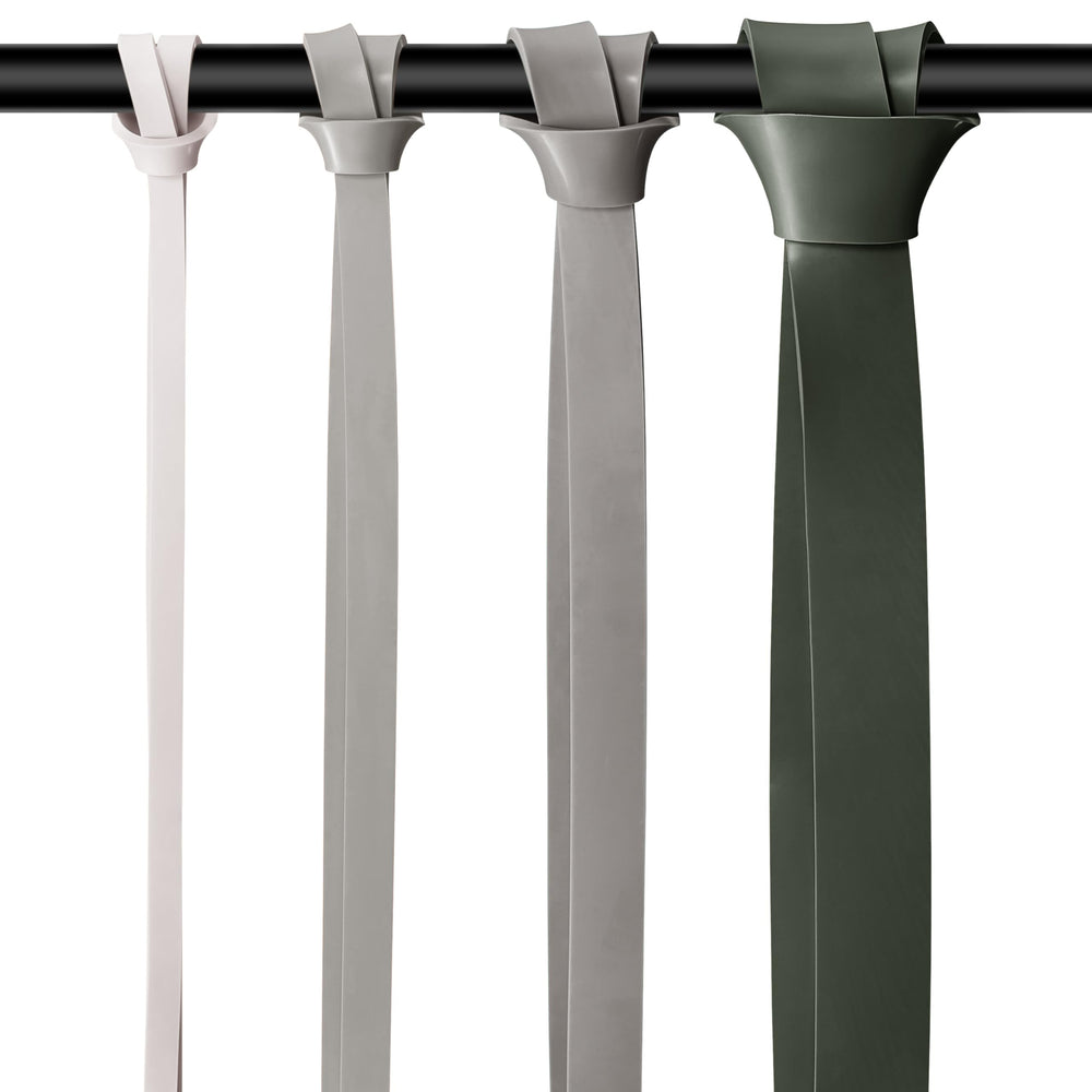 Retrospec in-use with band assisting a pull-up demonstrating progressive strength benefit