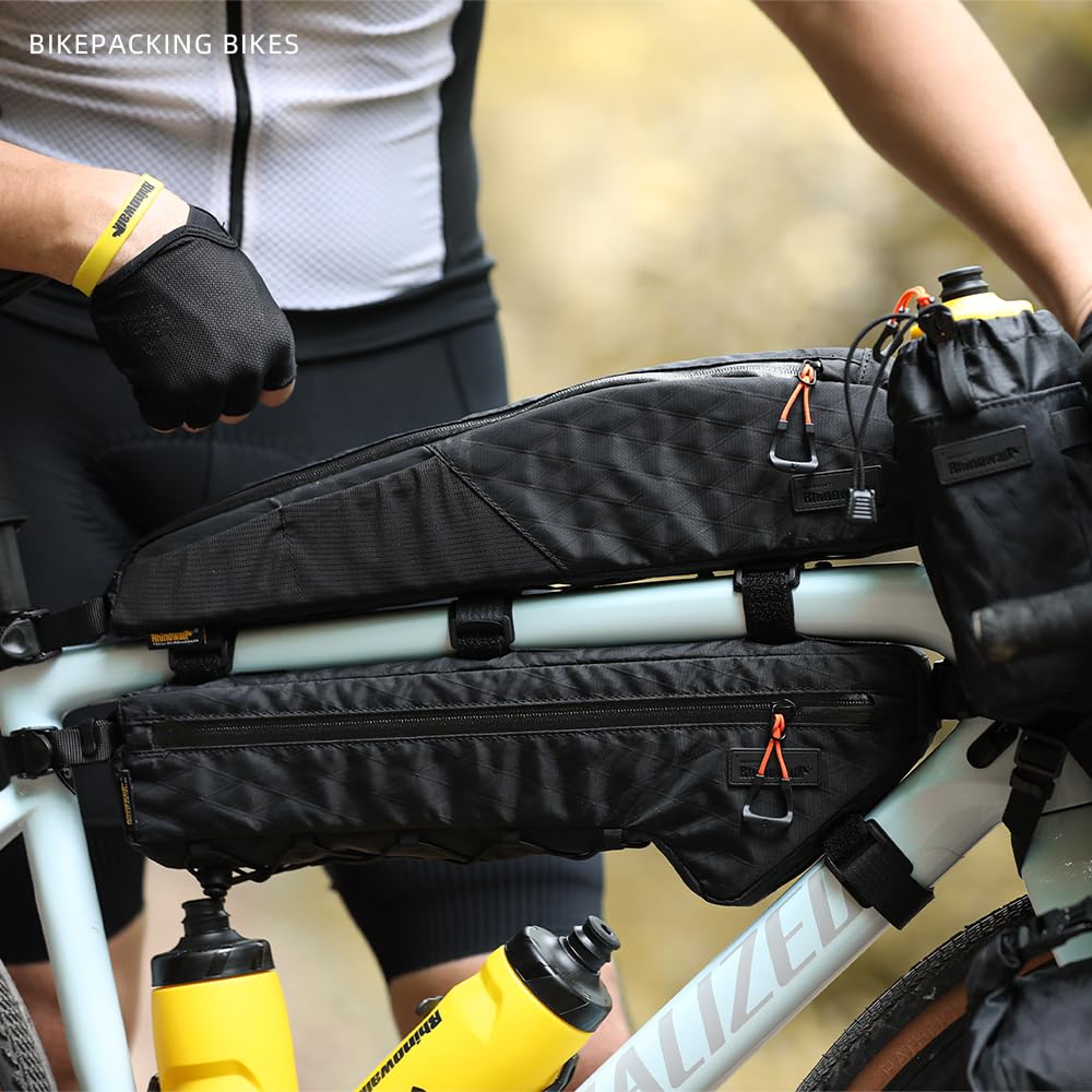 Rhinowalk lifestyle shot of commuter riding with the top tube bag for convenient storage