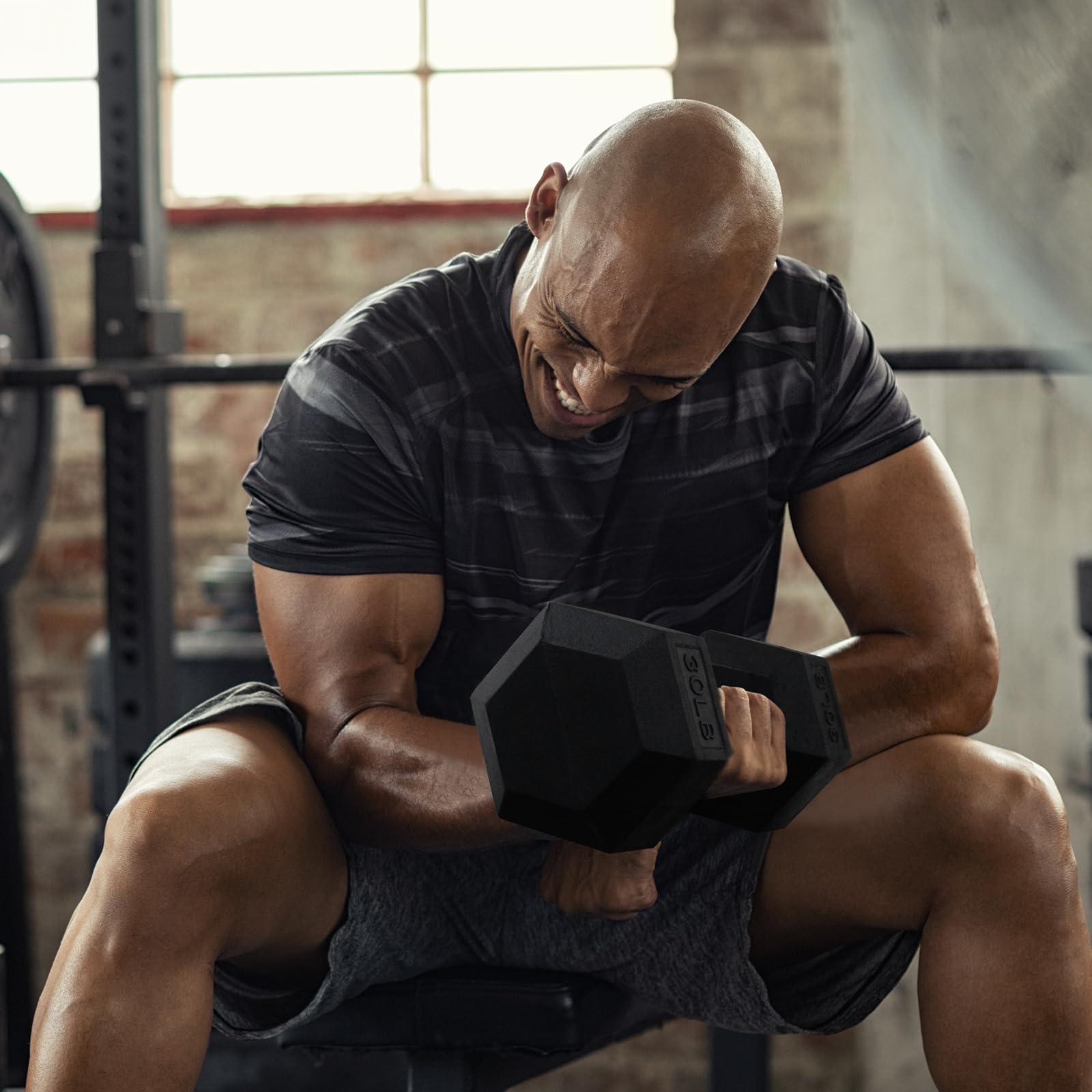 RitFit in a home gym lifestyle scene showing quiet, apartment-friendly training
