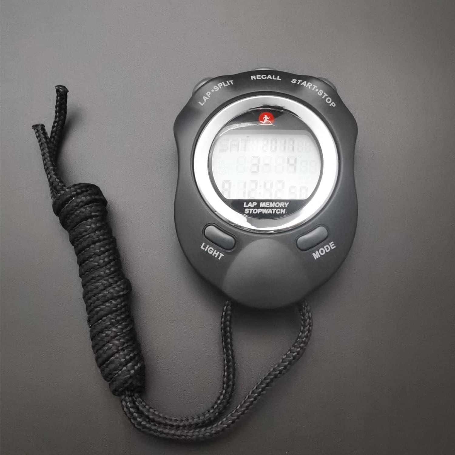 Rolilink next to smartphone showing compact size and portability