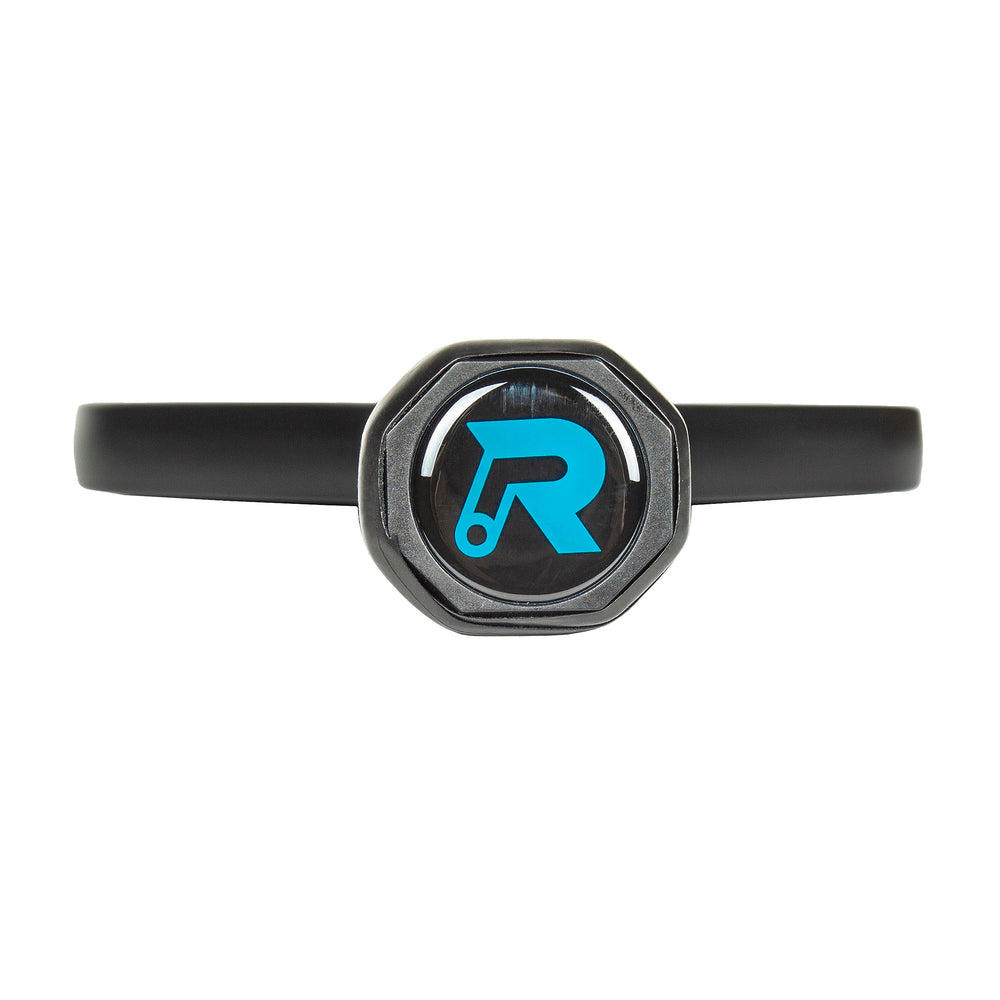 Ronbus paddle next to hand showing size and balanced weight
