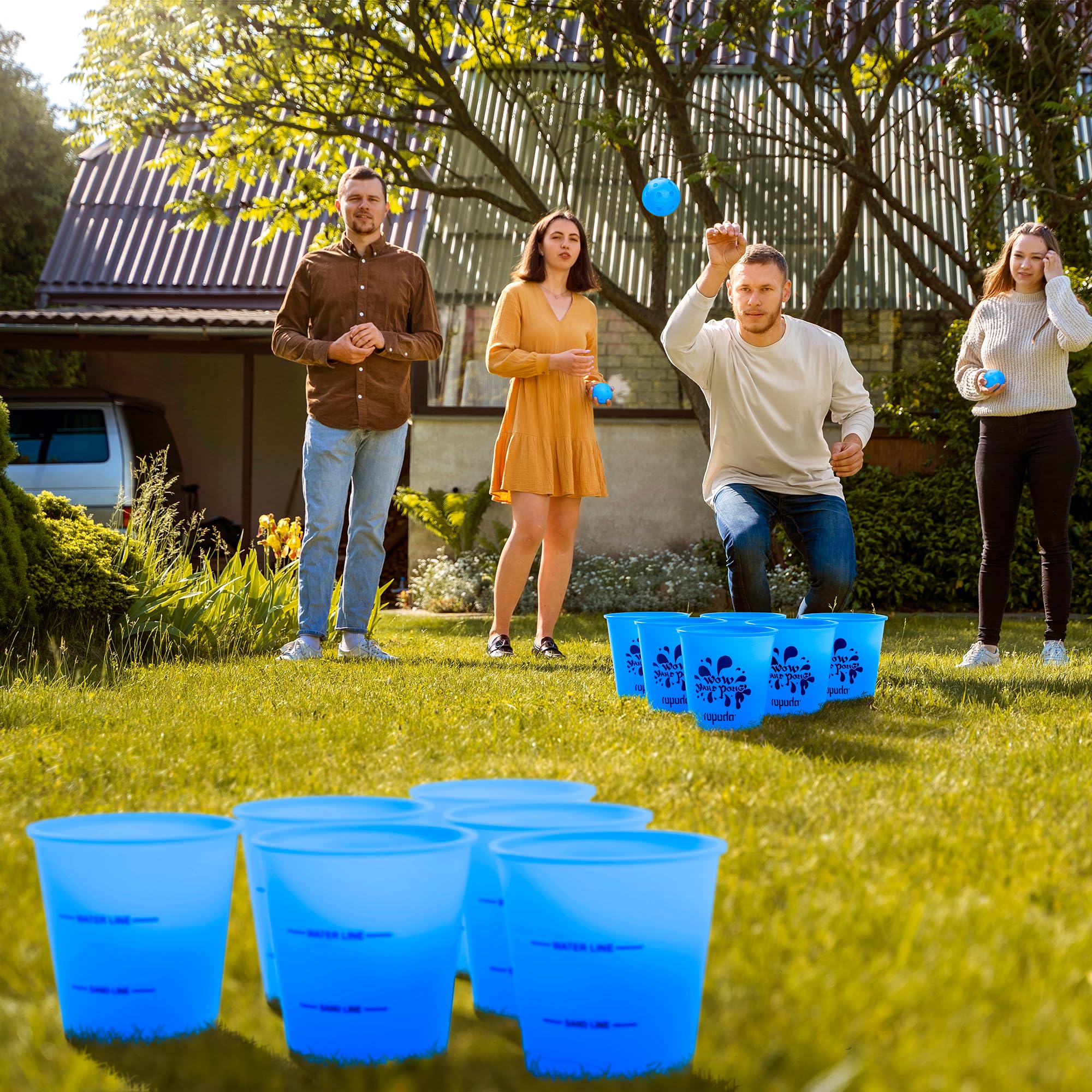 ropoda buckets beside soccer ball showing scale for quick size reference