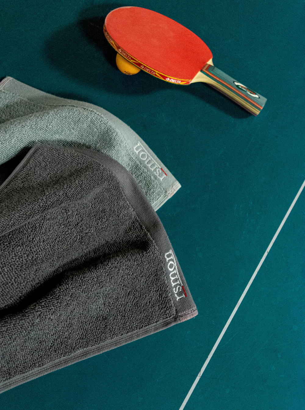 rsmon size comparison with water bottle demonstrating towel length and scale