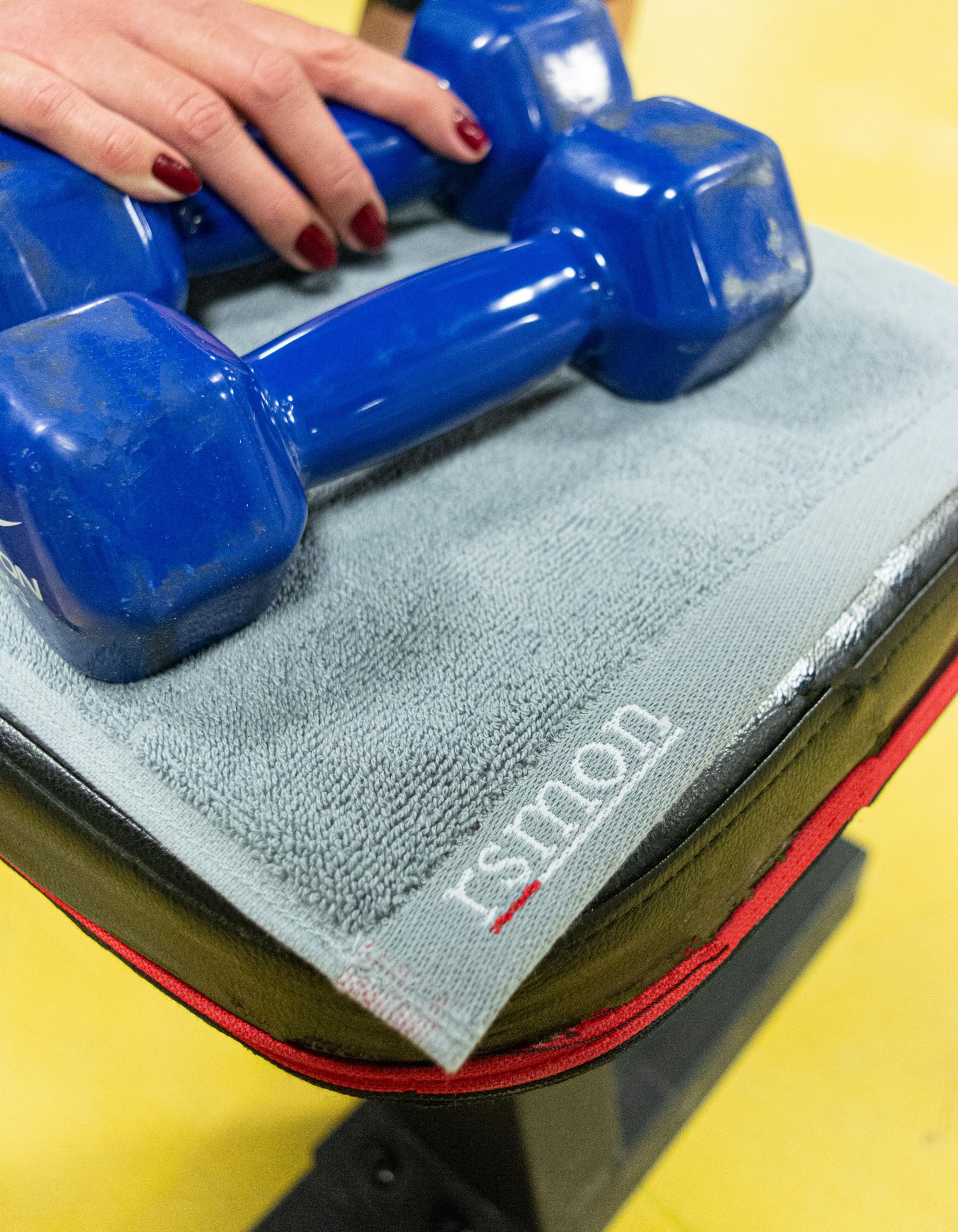 rsmon towel draped over shoulder in use illustrating sweat management