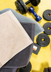rsmon towel folded inside gym bag showing compact transport benefit