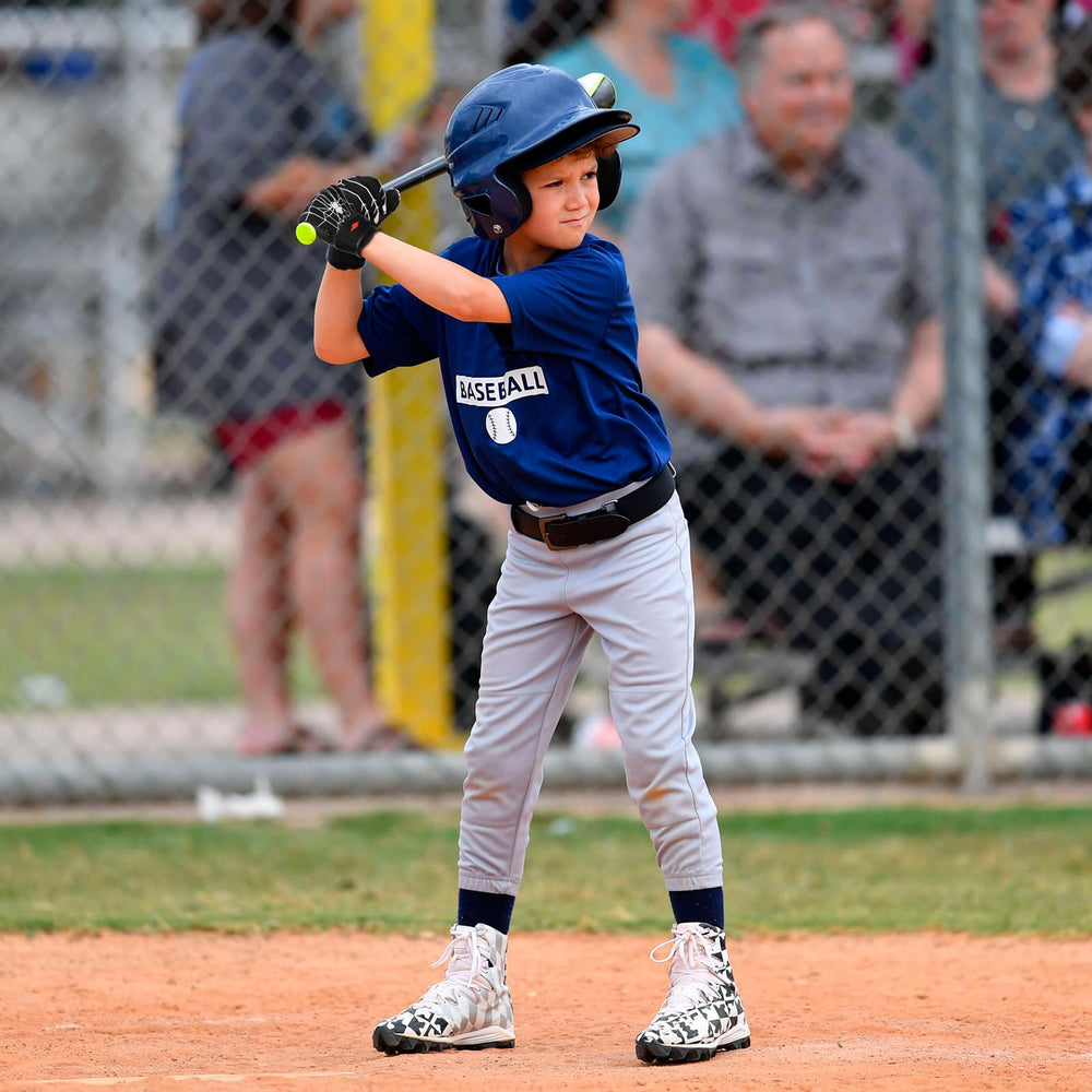 RSPGO youth batter wearing gloves during practice showing improved bat control benefit