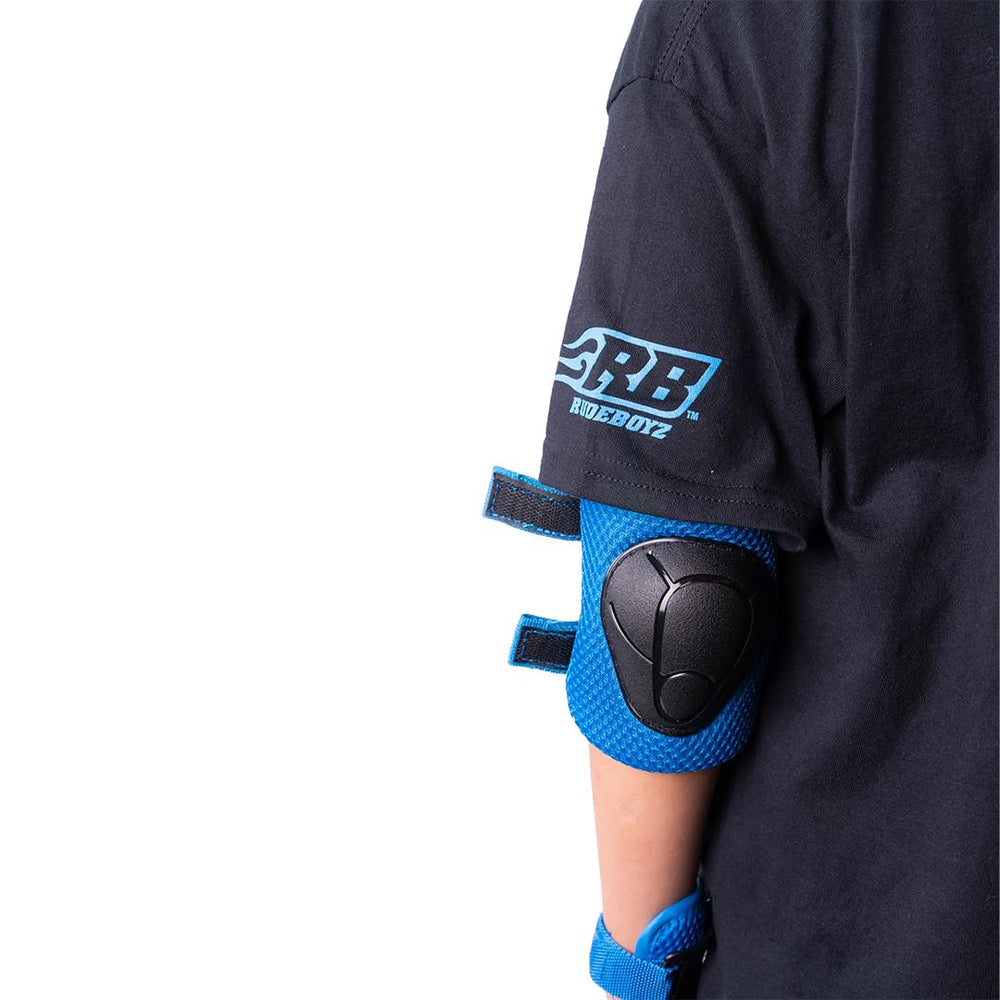 Rude Boyz pads in use at skatepark offering abrasion resistance
