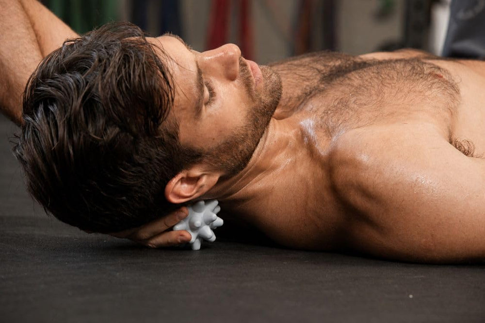 RUMBLE ROLLER Beastie inside gym bag highlighting travel-ready recovery