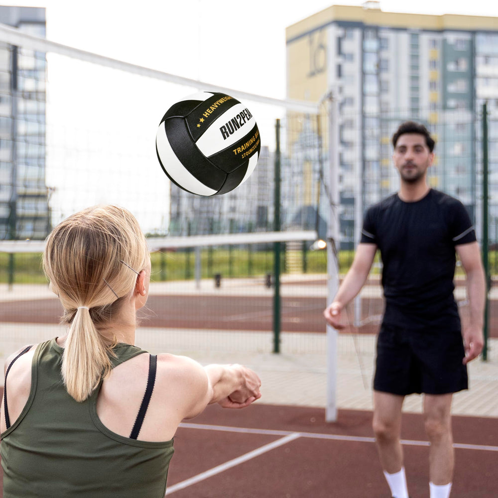 RUN2PEAK weighted volleyball bouncing off a rebounder for solo repetitive training