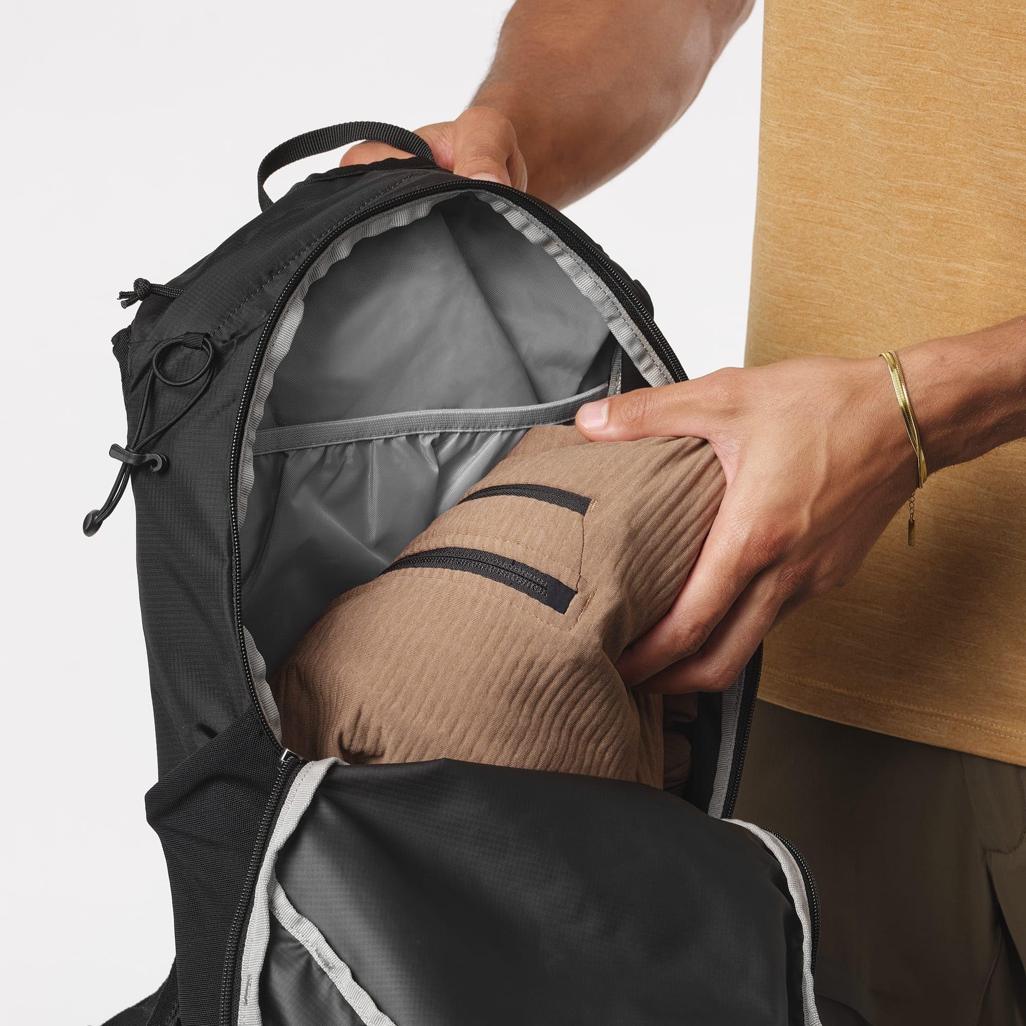 Salomon Trailblazer 30 beside hiking gear to show 30L scale and capacity
