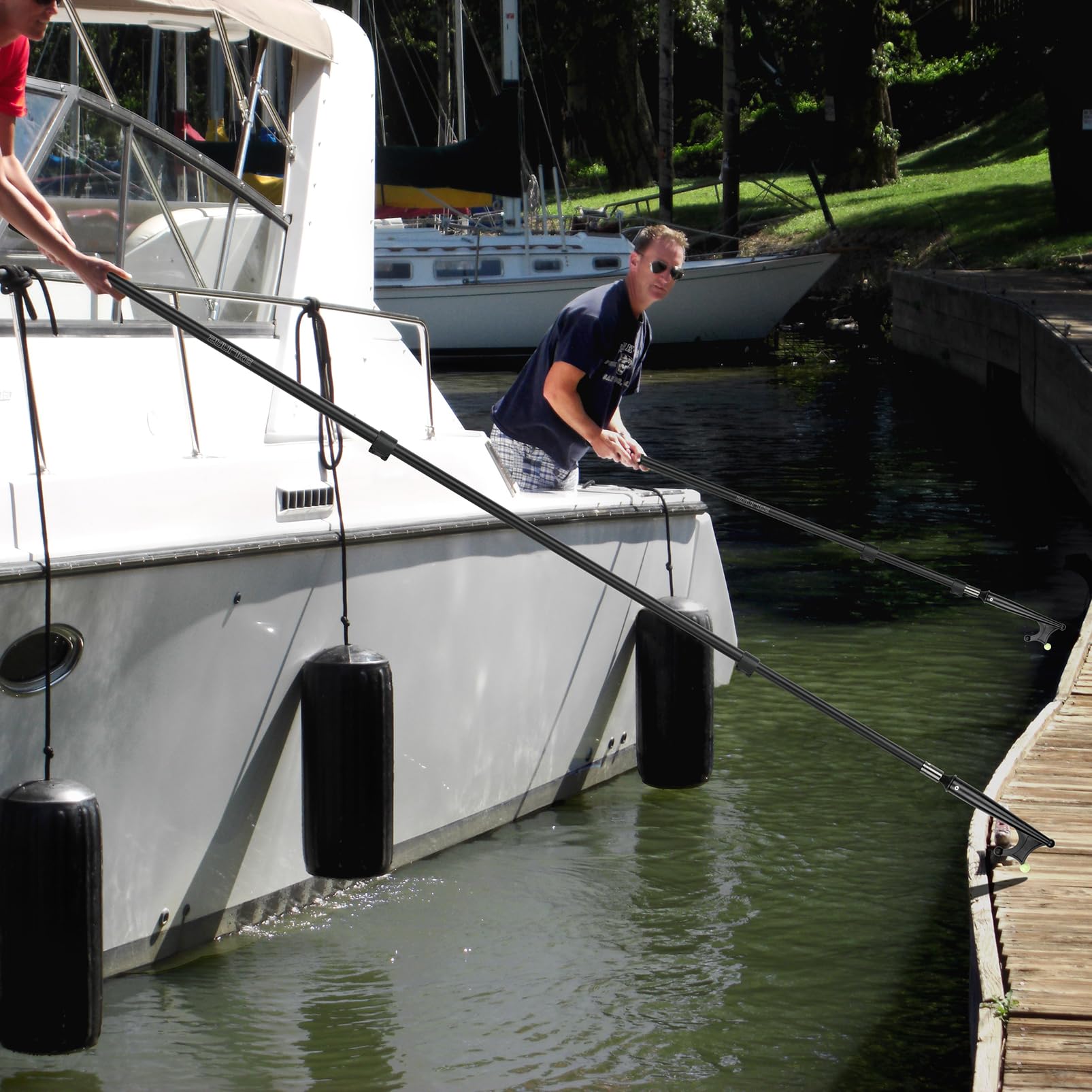 SANLIKE boat hook beside a hand showing scale and lightweight handling advantage