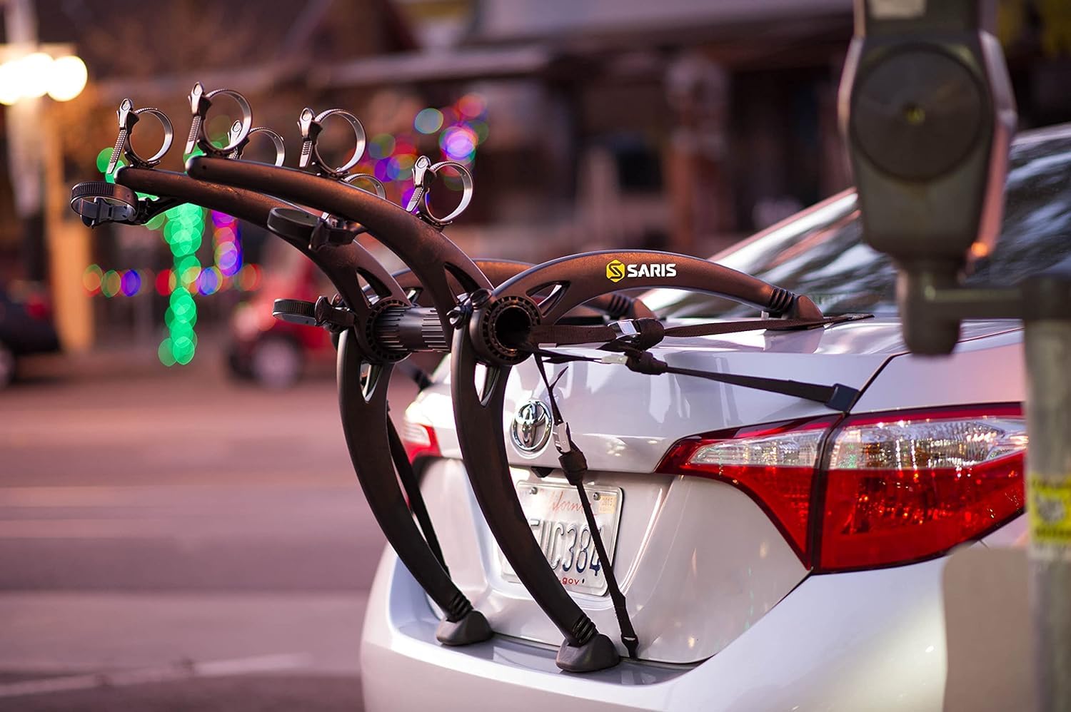 Saris Bones size scale beside a bike to show compact footprint advantage