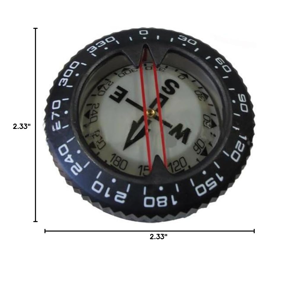 Scuba Choice compass beside ruler for scale indicating compact, travel-friendly size