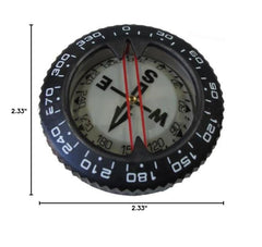 Scuba Choice compass beside ruler for scale indicating compact, travel-friendly size