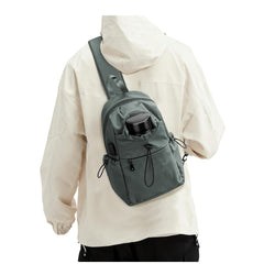 SEAFEW front view showing compact green exterior and zippered pocket for organized access