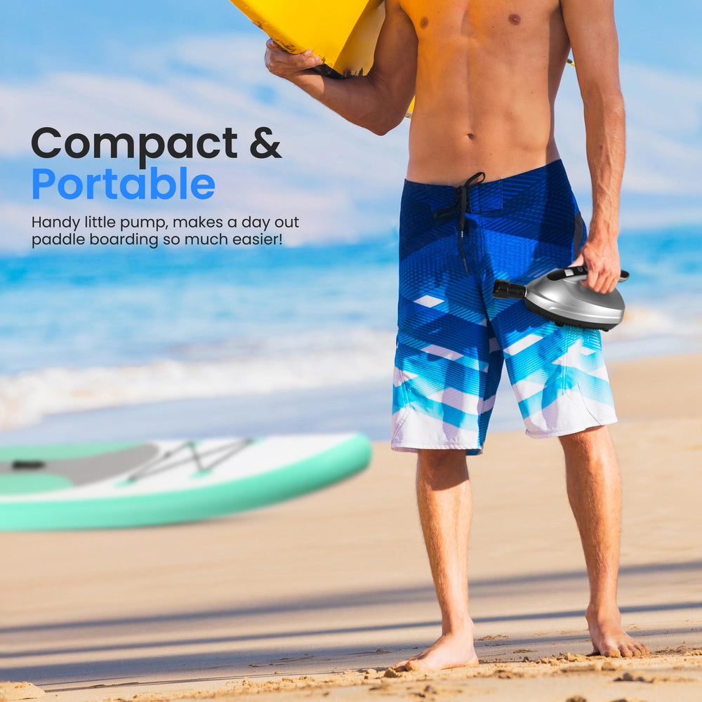 SereneLife inflating a SUP on water edge to minimize setup time before paddling